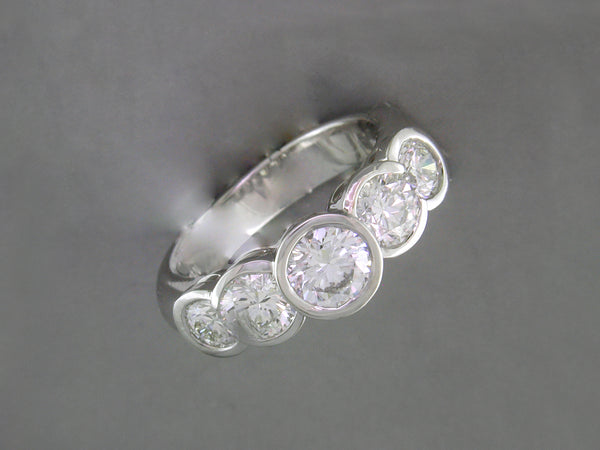 DIAMOND 5-STONE HALF-BEZEL RING