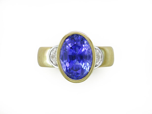 OVAL BLUE SAPPHIRE & HALF-MOON DIAMOND RING