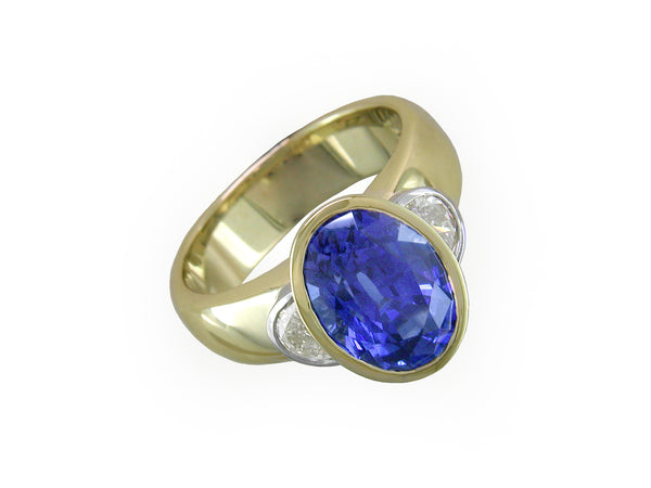 OVAL BLUE SAPPHIRE & HALF-MOON DIAMOND RING