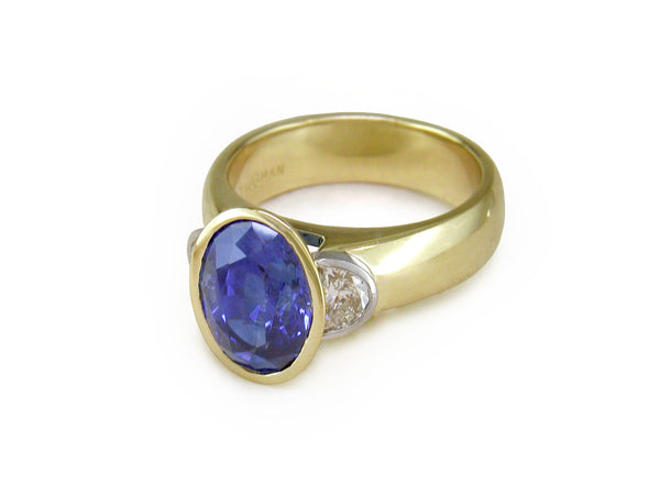 OVAL BLUE SAPPHIRE & HALF-MOON DIAMOND RING