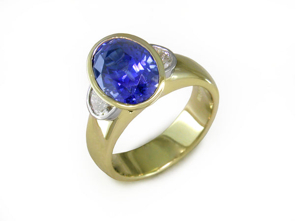 OVAL BLUE SAPPHIRE & HALF-MOON DIAMOND RING