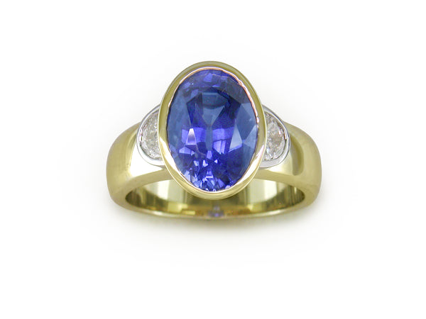 OVAL BLUE SAPPHIRE & HALF-MOON DIAMOND RING