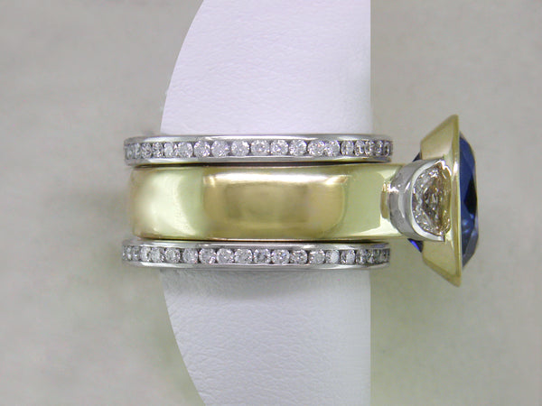 OVAL BLUE SAPPHIRE & HALF-MOON DIAMOND RING