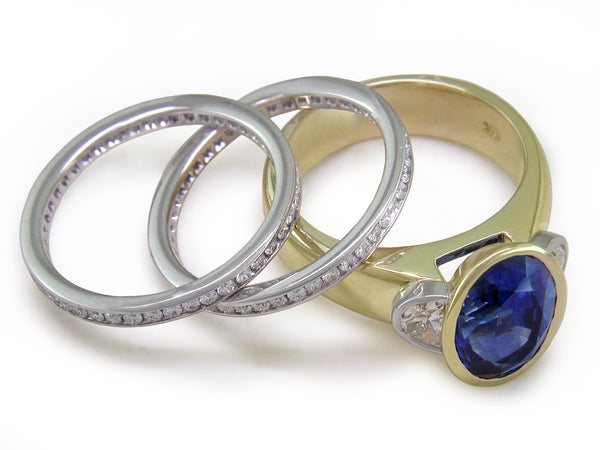 OVAL BLUE SAPPHIRE & HALF-MOON DIAMOND RING
