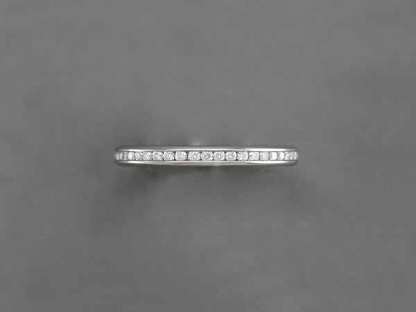 WHITE GOLD, WHITE DIAMOND CHANNEL SET ETERNITY RING