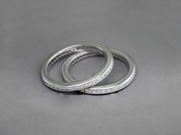 WHITE GOLD, WHITE DIAMOND CHANNEL SET ETERNITY RING