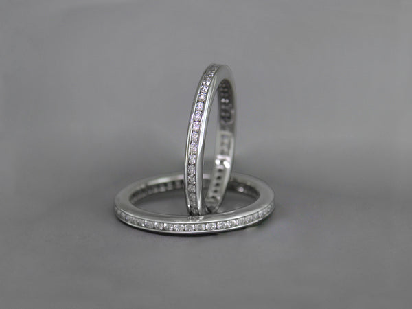 WHITE GOLD, WHITE DIAMOND CHANNEL SET ETERNITY RING